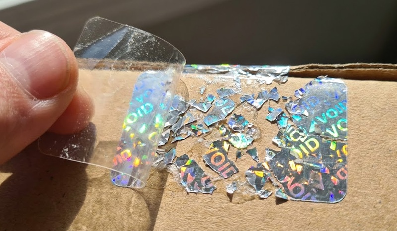 Tem hologram bị phá hủy khi cố tình bóc gỡ.