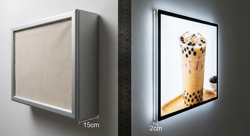 So sánh độ mỏng của tranh điện mica và hộp đèn thường.