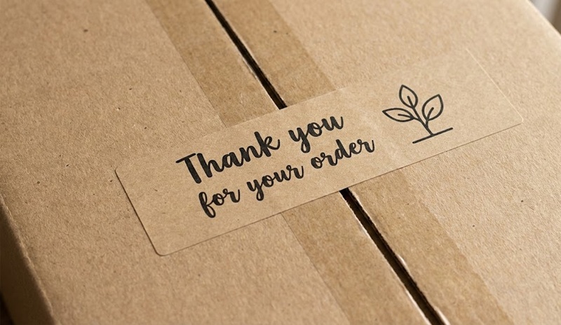 Sticker niêm phong giấy kraft dán hộp gói hàng.